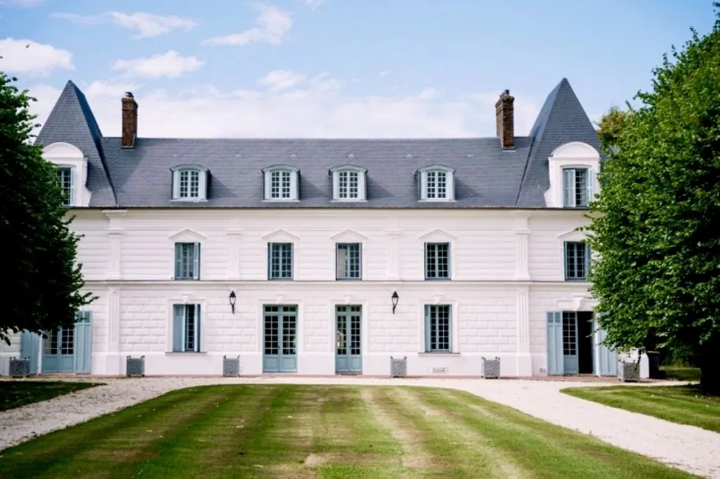 I went to a dinner party… & bought the château!